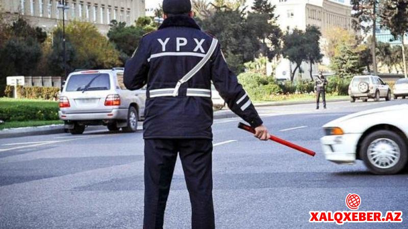 Masallıda RƏZALƏT: DYP əməkdaşı sürücünün şəxsiyyət vəsiqəsini tapdaladı - VİDEO