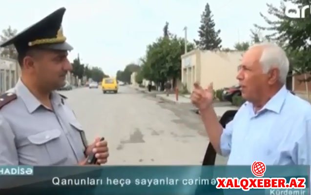 Qaydanı pozan sürücü polisə şeir dedi - Video